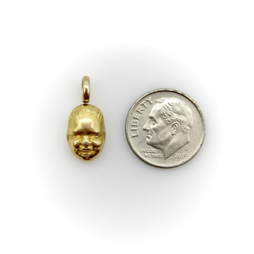Pendentif Pendentif/breloque vintage en or 18 carats représentant un visage de bébé souriant 58 Facettes A2002N