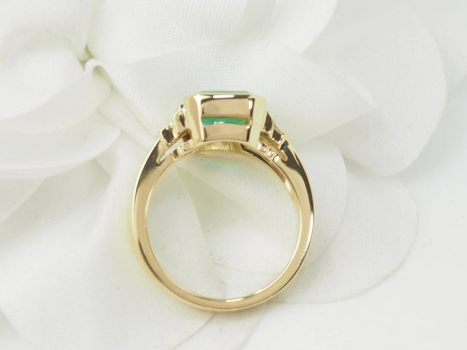 Bague 52.5 Bague en or jaune, émeraude et diamants 58 Facettes 33540