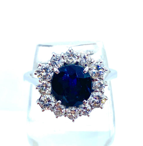 Bague Bague hexagonale sertie de diamants et ornée d'un saphir central 58 Facettes