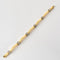 Bracelet Bracelet moderniste en or jaune et gris, et diamants 58 Facettes MEA43045