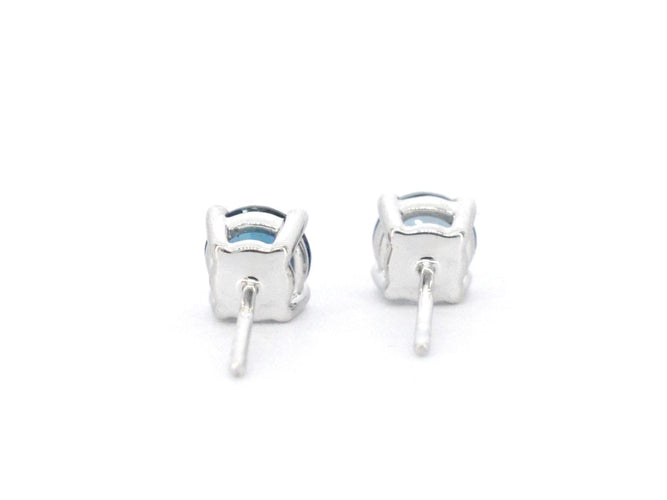 Boucles d'oreilles en or blanc avec topaze