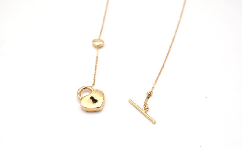 Collier Chaîne et pendentif cadena et coeur en or jaune 58 Facettes