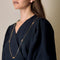 Collier DINH VAN - Rare sautoir de la collection Impression en or jaune et bois d'Amourette 58 Facettes LOR3480
