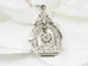 Pendentif Pendentif art déco des années 30 en or blanc et diamants 58 Facettes 27668