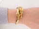 Bracelet vintage bracelet HERMES galop 2 tetes de chevaux ravinet d'enfert plaque or 58 Facettes 267396