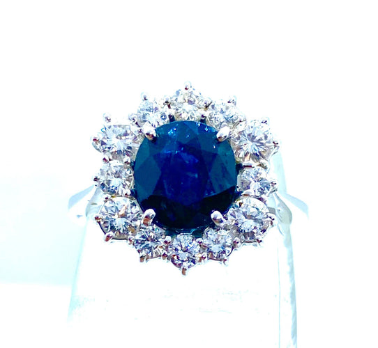 Bague Bague hexagonale sertie de diamants et ornée d'un saphir central 58 Facettes