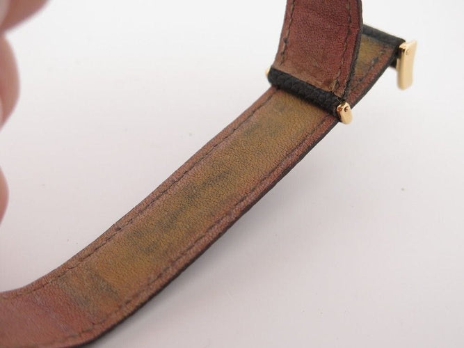 Montre vintage montre BOUCHERON carre 24 mm or jaune lezard mecanique 58 Facettes 258880