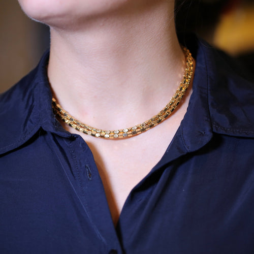 Collier Collier en or jaune 18K à deux rangs, signé MELLERIO. 58 Facettes