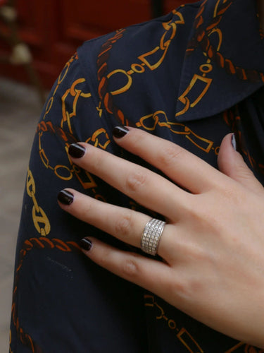 Bague Bague bandeau vintage en or blanc et diamants 58 Facettes J20