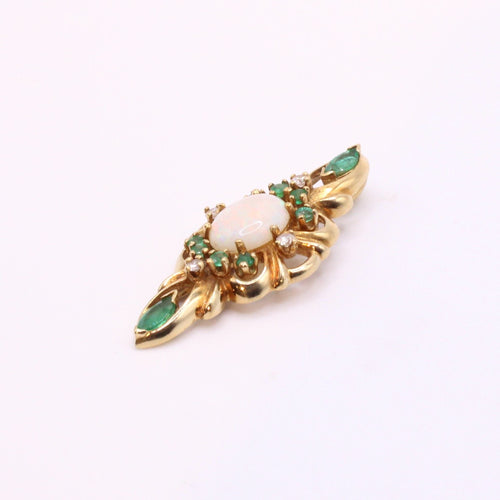 Pendentif Pendentif or jaune serti d’émeraudes, diamants et opale 58 Facettes