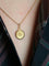 Pendentif PERROUD Pendentif vintage signe du zodiaque Gémeaux or jaune 58 Facettes 1099.25