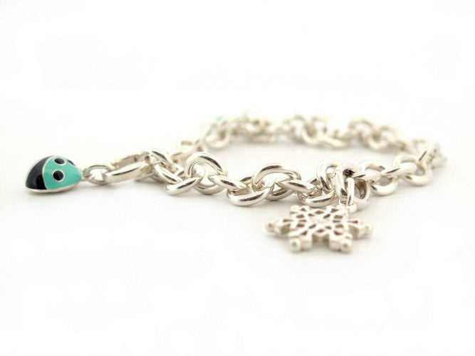 Bracelet bracelet TIFFANY & CO chaine a breloques charms argent 58 Facettes 259368