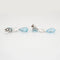 Boucles d'oreilles Boucles d'oreilles pendantes en or blanc avec topaze bleue et diamant 58 Facettes G13548