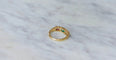 Bague 49 Bague jarretière or jaune émeraudes rubis et diamants 58 Facettes