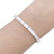Bracelet ligne, or blanc et diamants taille baguette.