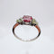 Bague Bague en or blanc de style vintage avec tourmaline ovale et péridots. 58 Facettes 50346
