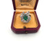 Bague 57 Bague en or blanc avec émeraude et diamants 58 Facettes