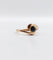 Bague 48 Bague tourbillon or jaune ornée d'un saphir (circa 1920) 58 Facettes A05082