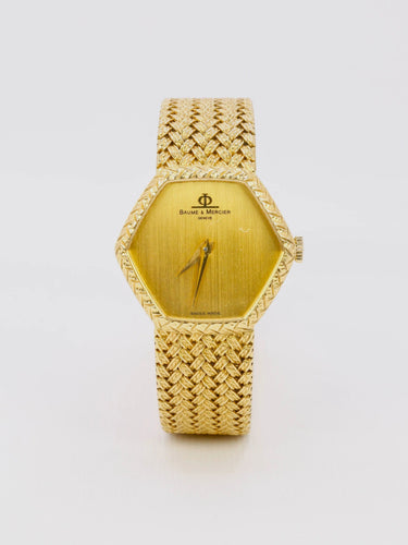 Montre BAUME & MERCIER - Montre vintage or jaune maille tressée 58 Facettes 1067.3