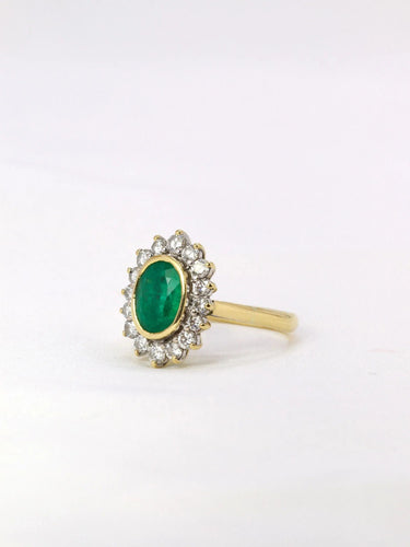Bague Bague marguerite émeraude ovale diamants 58 Facettes J396
