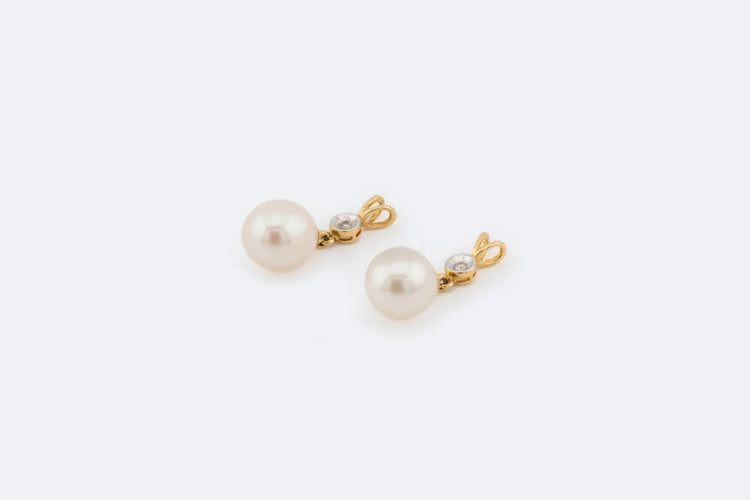 Boucles d'oreilles Boucles d'oreilles en or jaune avec perle et diamants 58 Facettes orc257