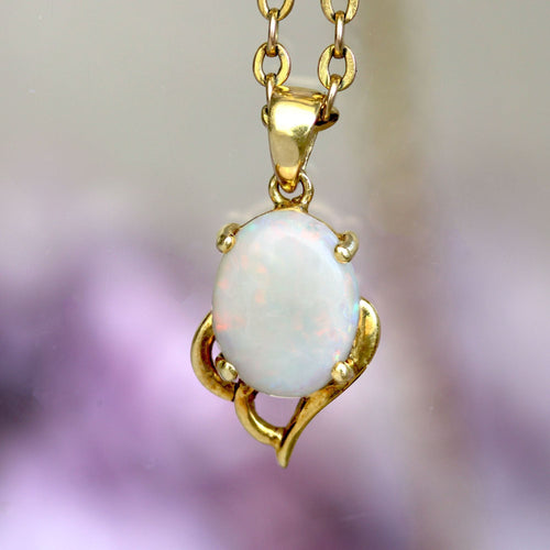 Pendentif Pendentif opale or jaune 58 Facettes 24-331B