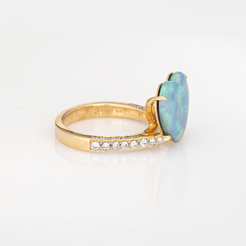 Bague Bague vintage en or jaune 18 carats, ornée d'une opale en forme de cœur et de diamant, taille 6,75. Bijou ancien de qualité. 58 Facettes G14030