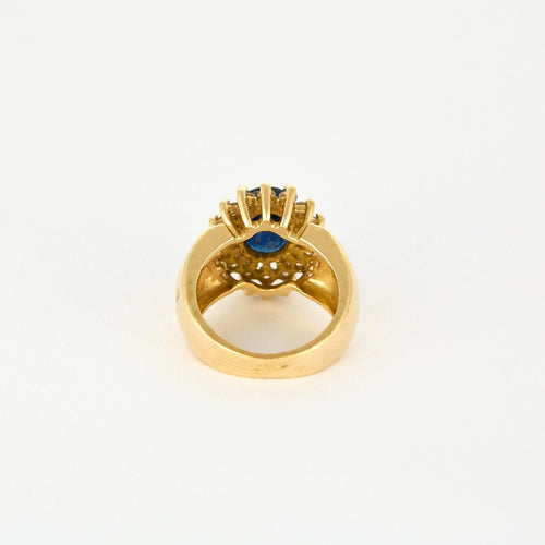 Bague 46 Bague marguerite, or jaune, saphir et diamants 58 Facettes CO2