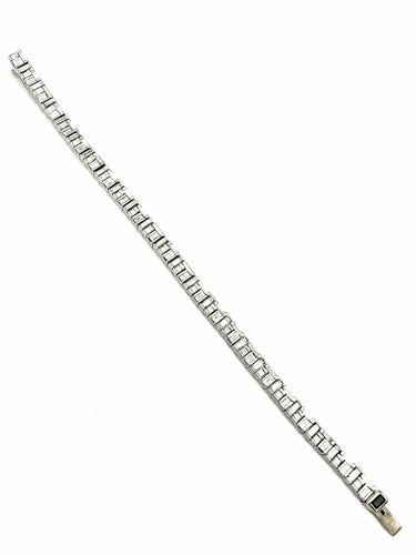 Bracelet CANTURI. Bracelet or balnc 18K et diamants baguettes. 58 Facettes