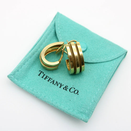 Boucles d'oreilles Boucles d'oreilles créoles Atlas vintage en or 18 carats de Tiffany & Co. 58 Facettes