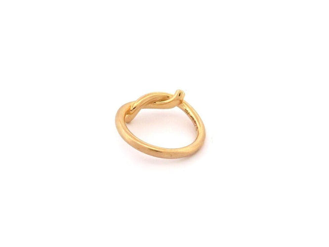 Bague 50 bague CARTIER entrelaces en or jaune 58 Facettes 264060