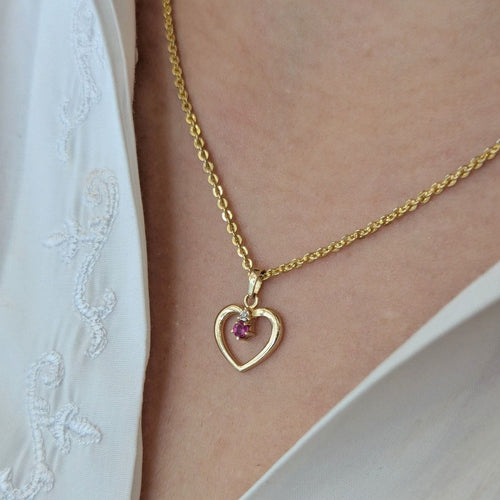 Pendentif Pendentif coeur en or jaune, diamant et rubis 58 Facettes 32309