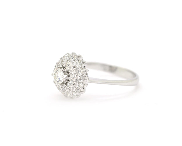 Bague Bague en or blanc entourée de diamants 58 Facettes