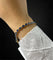 Bracelet Bracelet tennis en or jaune avec saphirs et diamants 58 Facettes
