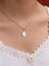 Pendentif Médaille amour AUGIS ronde or blanc Plus qu'hier Moins que demain 58 Facettes J631