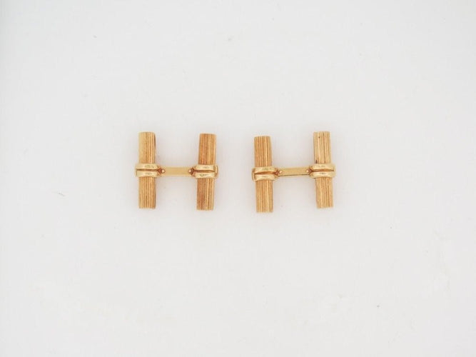 Boutons de manchette boutons de manchettes BOUCHERON en or 19 batonnets faisceaux 58 Facettes 260635