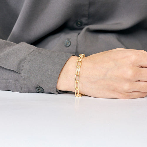 Bracelet Bracelet or jaune, maillons texturés et lisses 58 Facettes NAR0012
