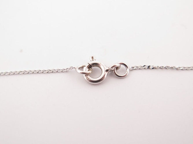 Collier collier TIFFANY & CO cle vintage ovale pendentif platine diamant 58 Facettes 258946