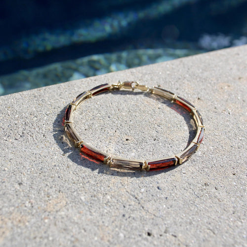 Montre Bracelet vintage en or 14 carats avec grenat et quartz fumé 58 Facettes A2000P