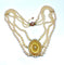 Collier Collier de perles 3 rangs, médaillon or 18 carats et fermoir rubis 58 Facettes AB354
