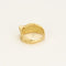 Bague en or jaune à motif de noeud stylisée