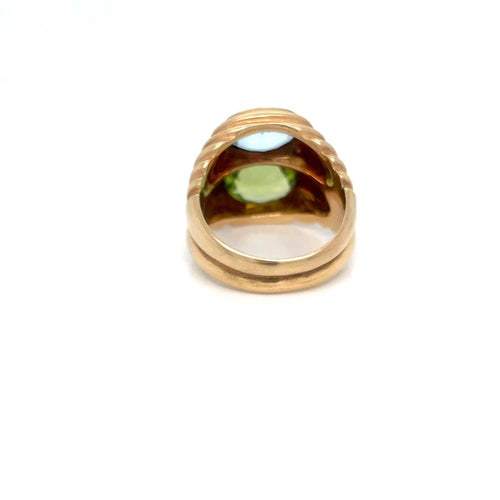 Bague 52 BULGARI - Bague Double Baccellato, or jaune avec topaze bleue et péridot, vers 1980 58 Facettes