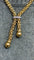 Collier Collier maille Popcorn à pompons en or 18 carats 58 Facettes