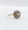 Bague 53.5 Bague marguerite circa 1910 en or 18k, platine et diamants 58 Facettes A06629
