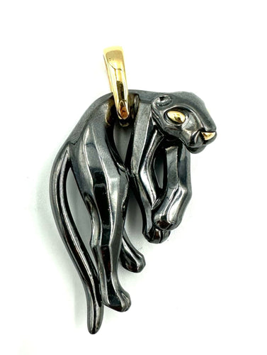 Pendentif CARTIER. Collection "Panthère", pendentif or jaune et silverium 58 Facettes
