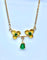 Collier Collier pendentif trilobé en or jaune 18 carats et émeraudes 58 Facettes AB675