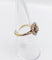 Bague 53.5 Bague marguerite circa 1910 en or 18k, platine et diamants 58 Facettes A06629