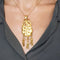 Pendentif Pendentif porte souvenir en or jaune 58 Facettes HOU5531