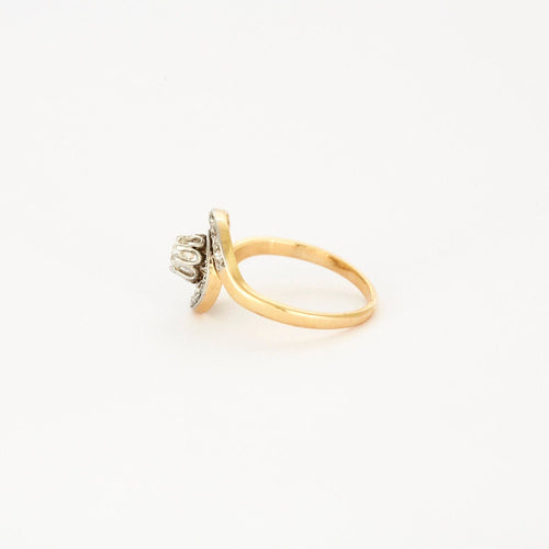 Bague Bague tourbillon en or jaune et platine sertie de diamants 58 Facettes