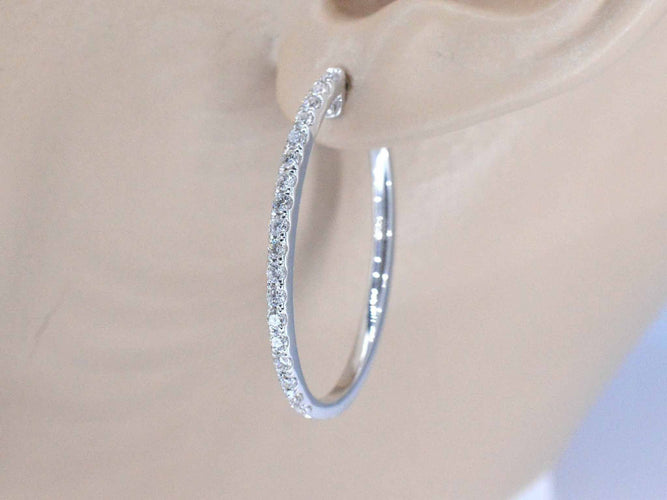 Boucles d'oreilles Boucles d'oreilles créoles en or blanc avec diamants 58 Facettes 2051